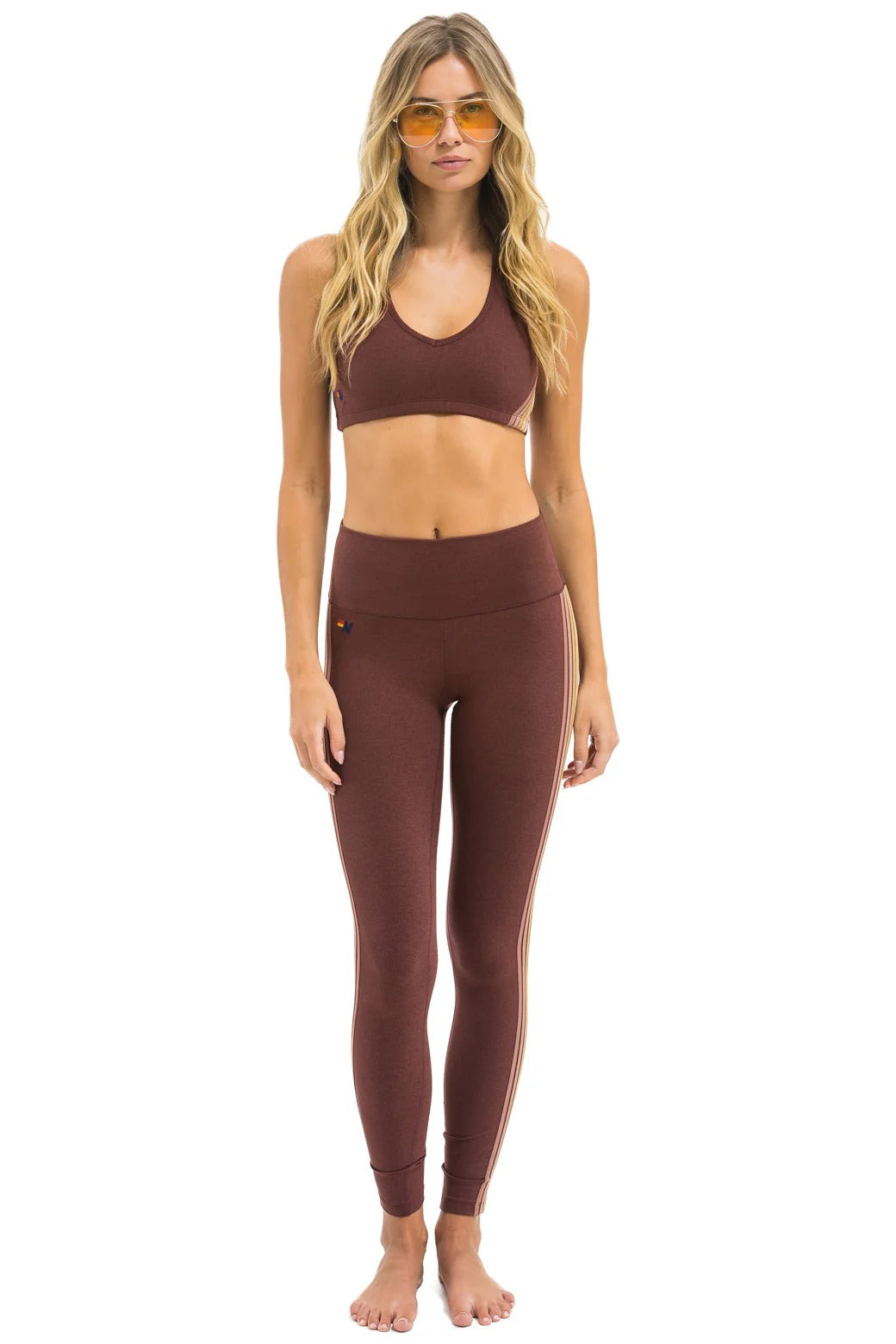 High-rise full-length leggings featuring five stripes, designed for performance and comfort during workouts and daily wear-2