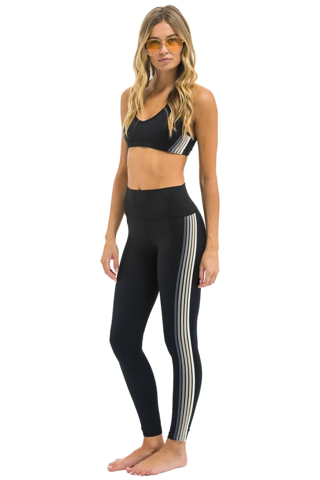 High-rise full-length leggings featuring five stripes, designed for performance and comfort during workouts and daily wear-4